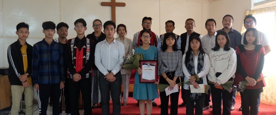 The students along with Er Lanusungkum Aier during the KLST annual Jubilee Memorial Education Merit Award programme for HSLC toppers held in Kohima on June 12. (Photo Courtesy: DIPR Photo)